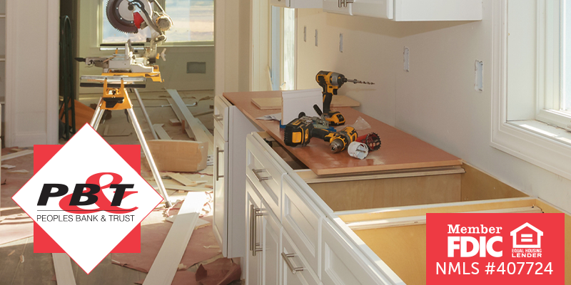 Kitchen in a home that is currently under a renovation with removed kitchen counters and flooring